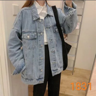 Модна жіноча джинсова куртка з кишенями M-XL ER 1831 фото